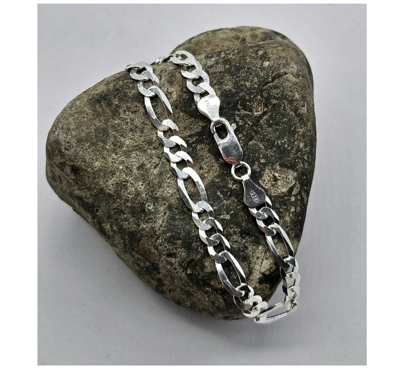 Pulsera Cartier de plata ley 925 para hombre, joya italiana exclusiva y duradera.