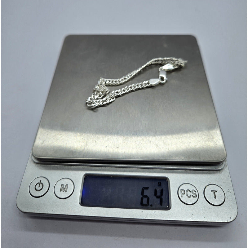 Pulsera doble grumet en plata italiana 925, joya exclusiva y resistente para hombre.