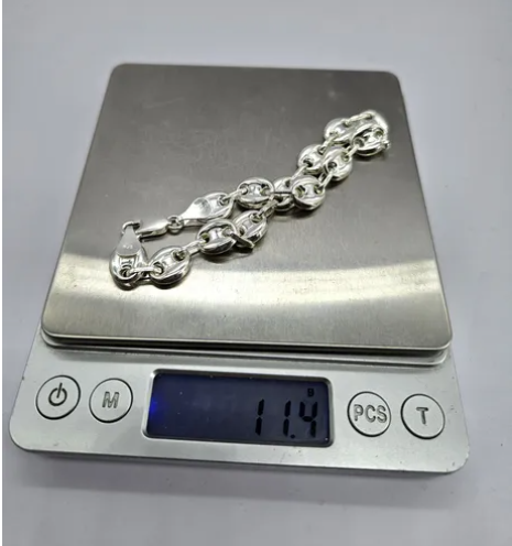 Pulsera Gucci plata italiana 925, joya exclusiva para hombres con estilo.