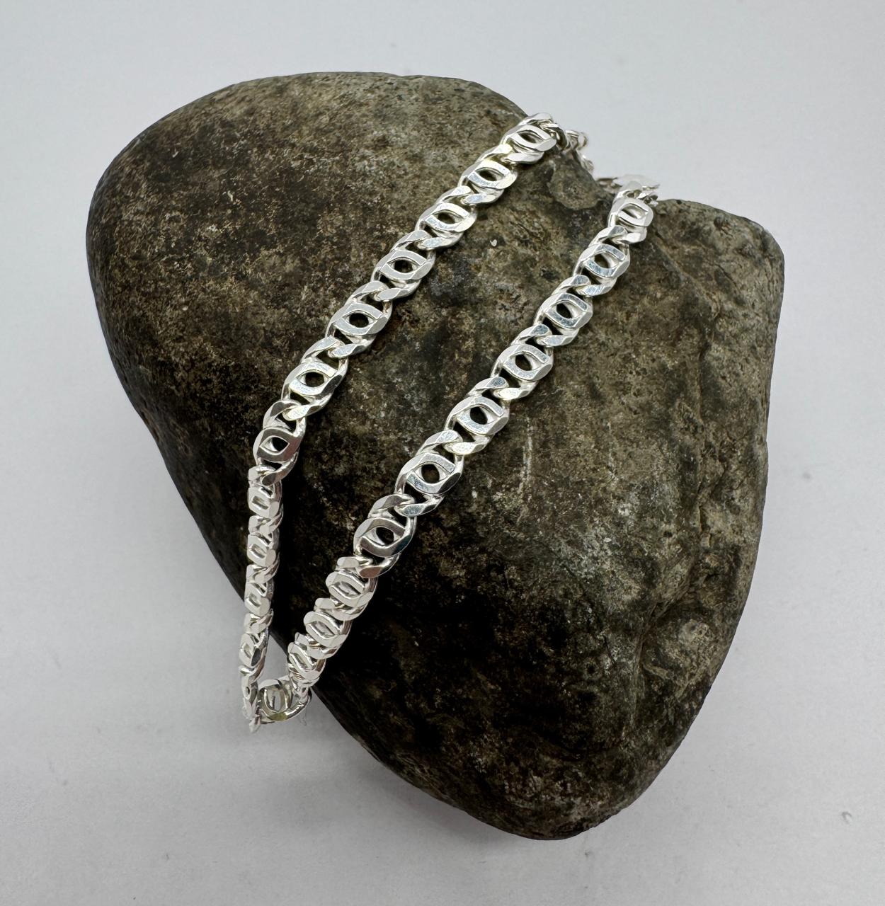 Pulsera exclusiva ojo de tigre plata italiana 925, símbolo de fuerza y elegancia.